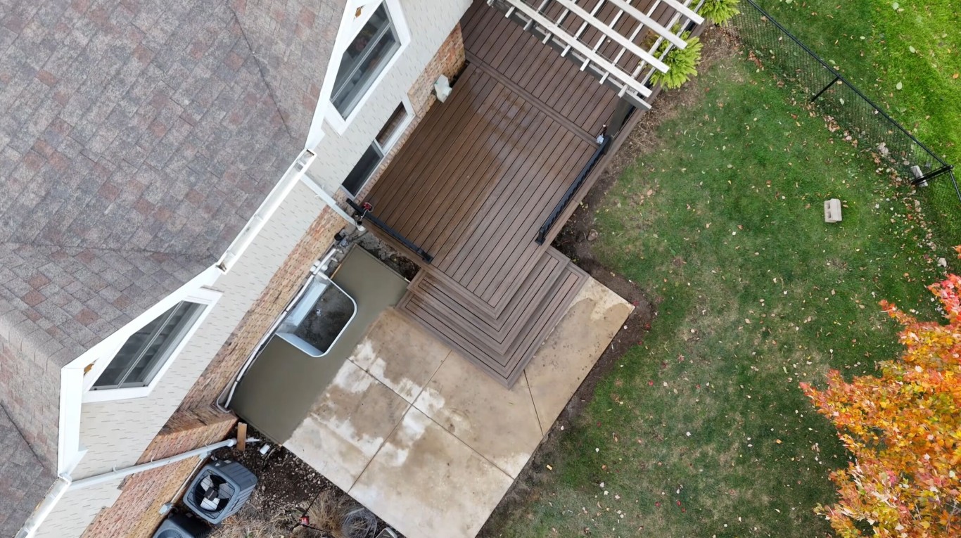 Aerial view of custom deck installation with multiple functional zones