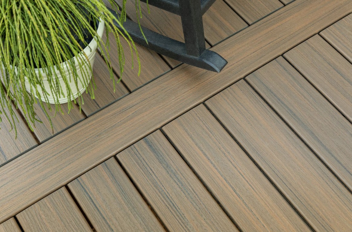 Durable composite deck materials with wood grain texture